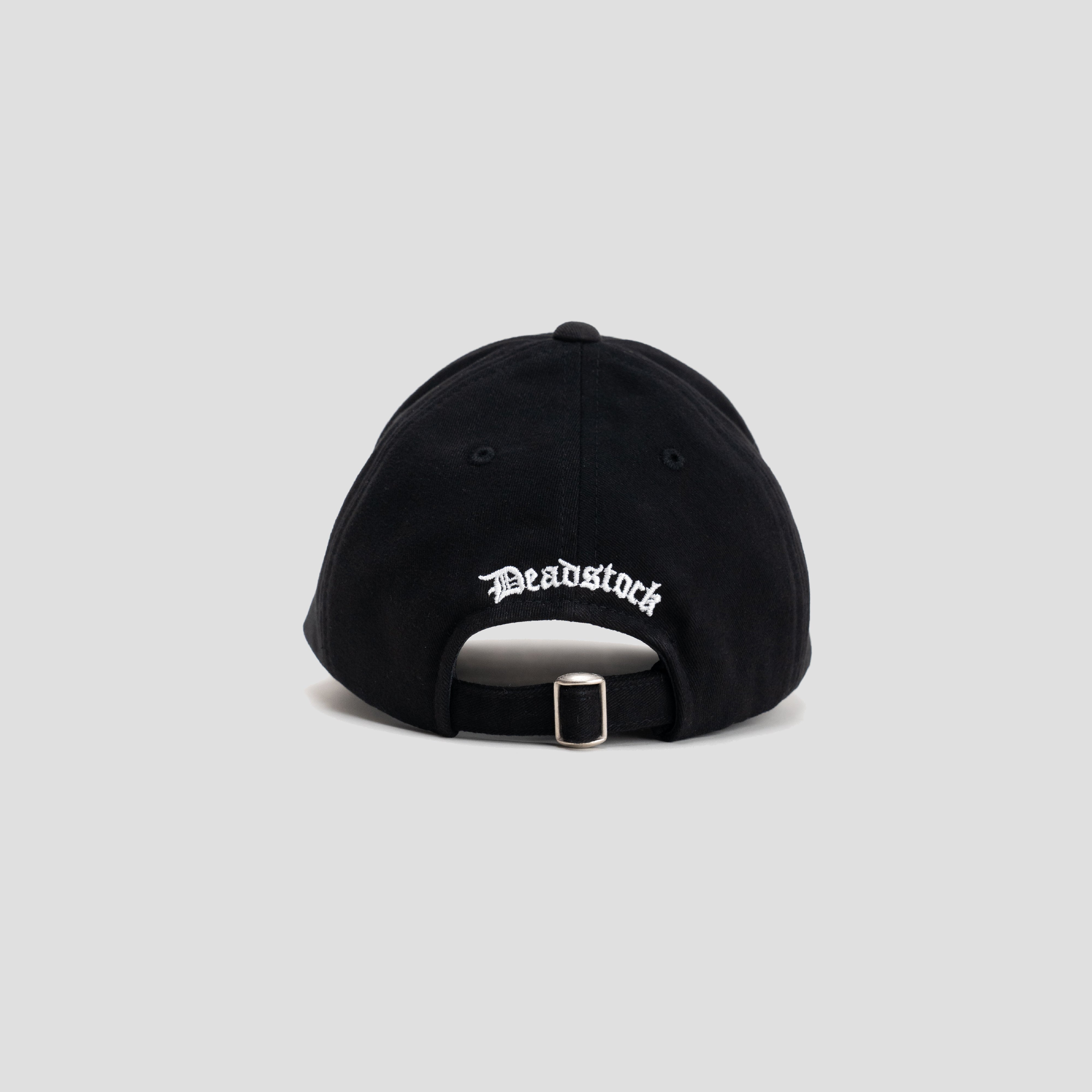 The back of a black hat with Deadstock embroidered in white