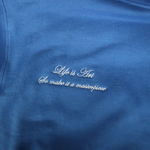 Load image into Gallery viewer, Life is Art so Make it A Masterpiece embroidered on cobalt blue hoodie
