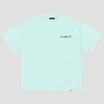 Load image into Gallery viewer, The front of a blue shirt with deadstock clo printed on the left chest
